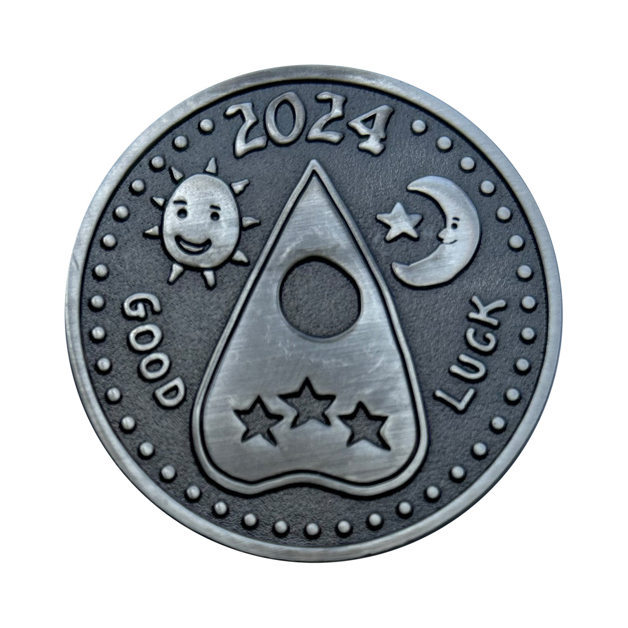 collectible coin with Ouija planchette.